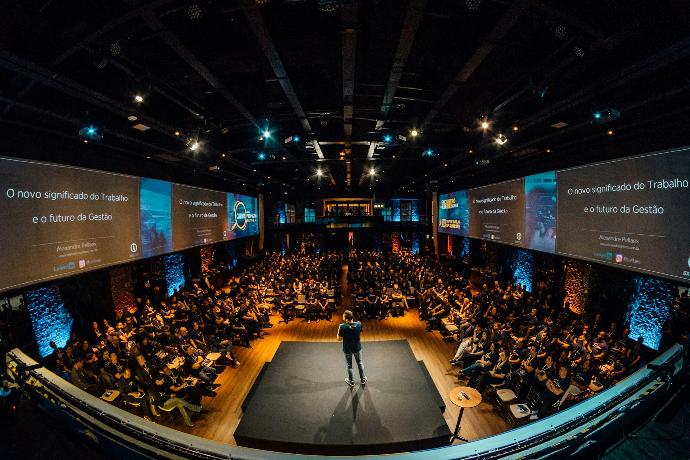 people sitting on chairs watching a game